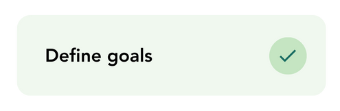 A light green rectangular box with the text "Define goals" on the left and a green check mark in a circle on the right, perfect for organizing your financial planning or other important objectives.